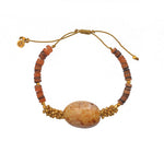 Bracelet cordon coquillage