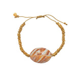 Bracelet cordon doré et coquillage
