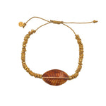 Bracelet cordon doré et coquillage