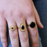 Bague dorée pierre ronde 4 griffes