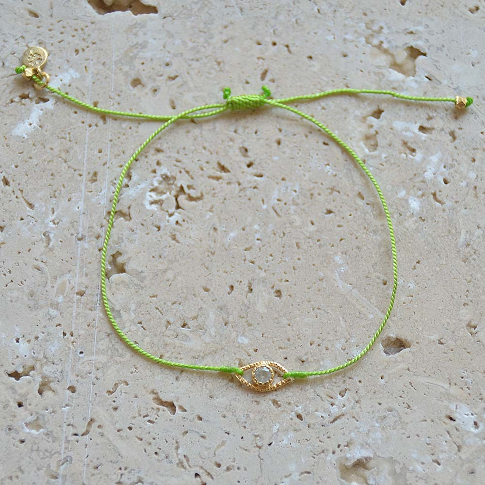 Bracelet cordon et oeil pierre