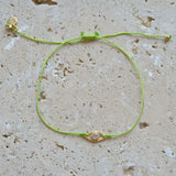 Bracelet cordon et oeil pierre