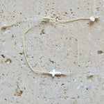 Bracelet tressé et croix argent 925