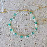 Bracelet tressé doré et perles