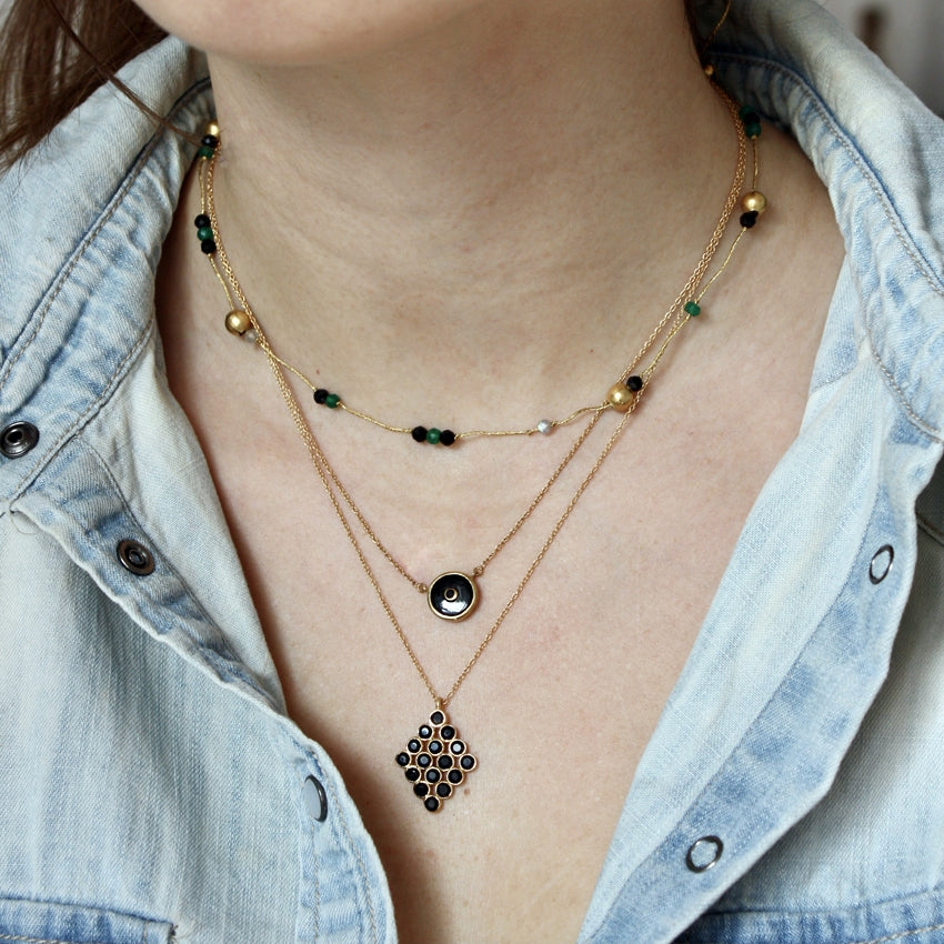 Collier doré et onyx noire