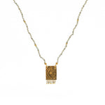Collier cordon pierres plaque astres et pampilles -