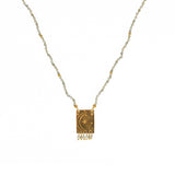 Collier cordon pierres plaque astres et pampilles -