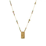 Collier doré multi pierres et pendentif plaque demi soleil