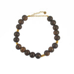 Bracelet de cheville doré et perles de bois