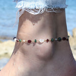 Bracelet de cheville doré et pierres