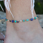 Bracelet de cheville doré et pierres