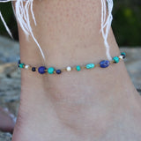 Bracelet de cheville doré et pierres