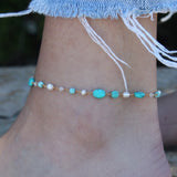 Bracelet de cheville doré et pierres