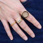 Bague dorée pierre ronde plate