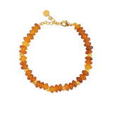 Bracelet corne orangée et disques dorés