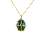 Collier doré pierre cabochon et cage dorée - ONYX VERTE &