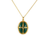 Collier doré pierre cabochon et cage dorée - ONYX VERTE &