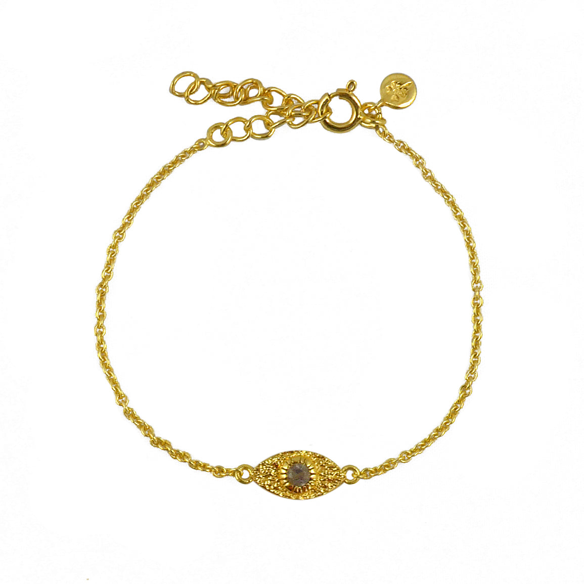 Bracelet doré et oeil martelé et pierre