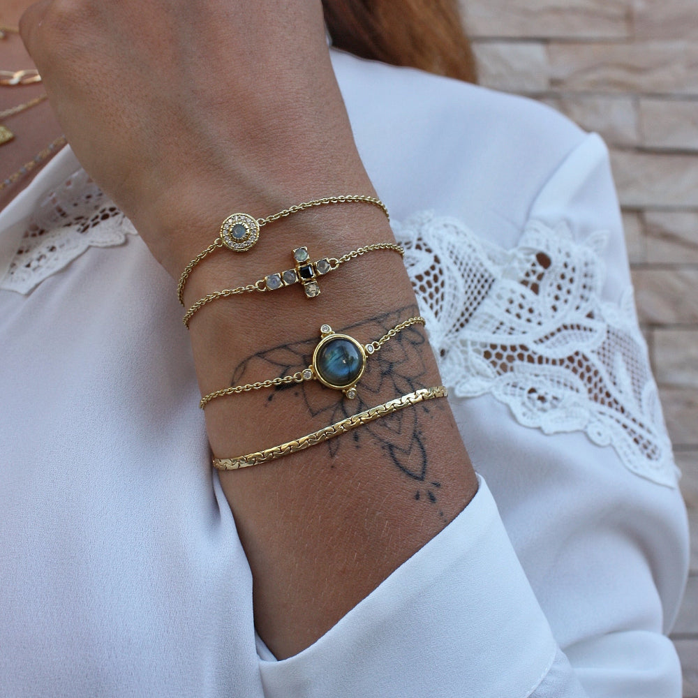 Bracelet doré sphère pierre et 4 zircons