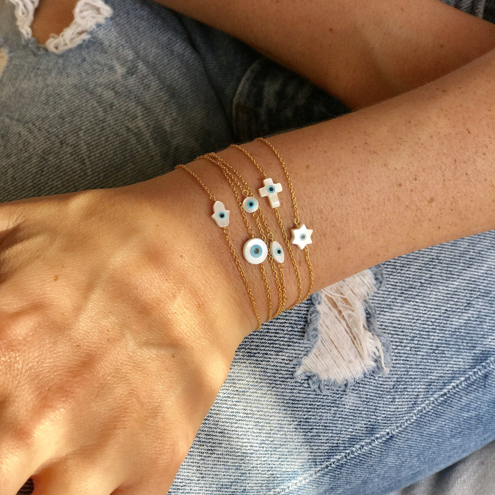 Bracelet doré oeil porte bonheur en nacre