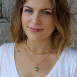 Collier dorée pendentif pierre cabochon pivotant