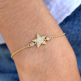 Bracelet doré étoile zircons et pierres