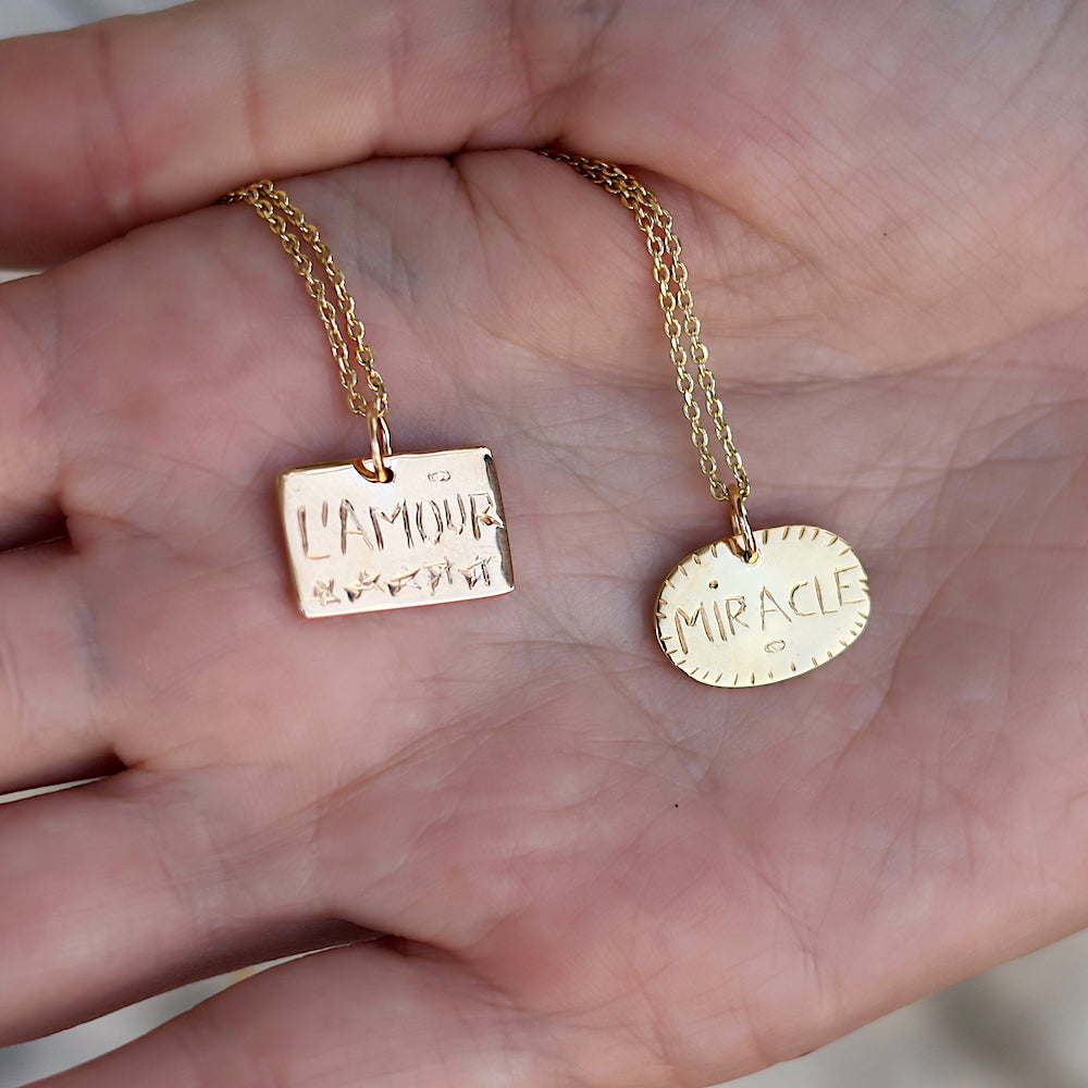 Collier doré et médaille oeil miracle - Colliers