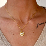 Collier doré médaille étoile pierre et zircons