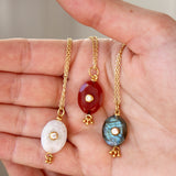 Collier doré pierre non serti pampilles et zircon -