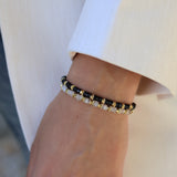 Bracelet doré onyx noir heishi et disques dorés
