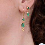 Golden earrings with stones and tassels