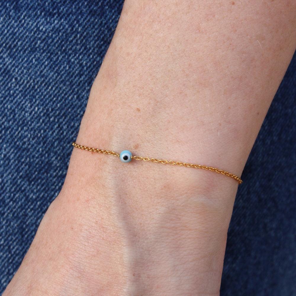 Bracelet doré oeil porte bonheur en nacre