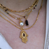 Gold necklace and pendant with 4 faceted stones