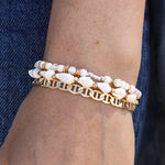 Bracelet mix perles disques dorés et noeuds