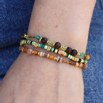 Bracelet mix perles disques dorés et noeuds