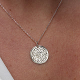Collier argent 925 et médaille fleur estampillée