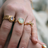 Bague dorée croix pierre et zircon