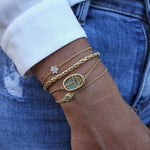 Bracelet doré scarabée pierre