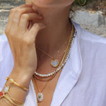 Collier doré coeur pierre contour martelé