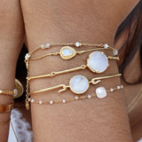 Bracelet doré barres martelées et pierre ronde