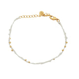 Bracelet doré cordon blanc pierre de lune et perles dorées