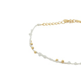 Bracelet doré cordon blanc pierre de lune et perles dorées