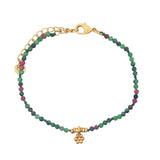 Gold bracelet with tassel and natural stones