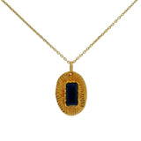 Gold necklace with textured oval pendant and stone