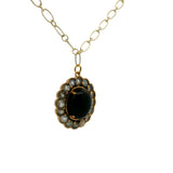 Collier doré fleur cabochon avec onyx noir et labradorite 60cm