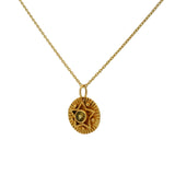 Gold necklace with star and stone medal