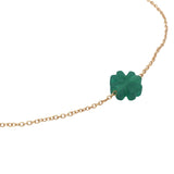 Bracelet doré trèfle onyx verte avec étoile des vents dessus