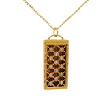 Collier doré plaque rectangulaire zircons blancs
