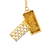 Collier doré plaque rectangulaire zircons blancs