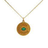 Gold necklace with lucky charm medal and stone